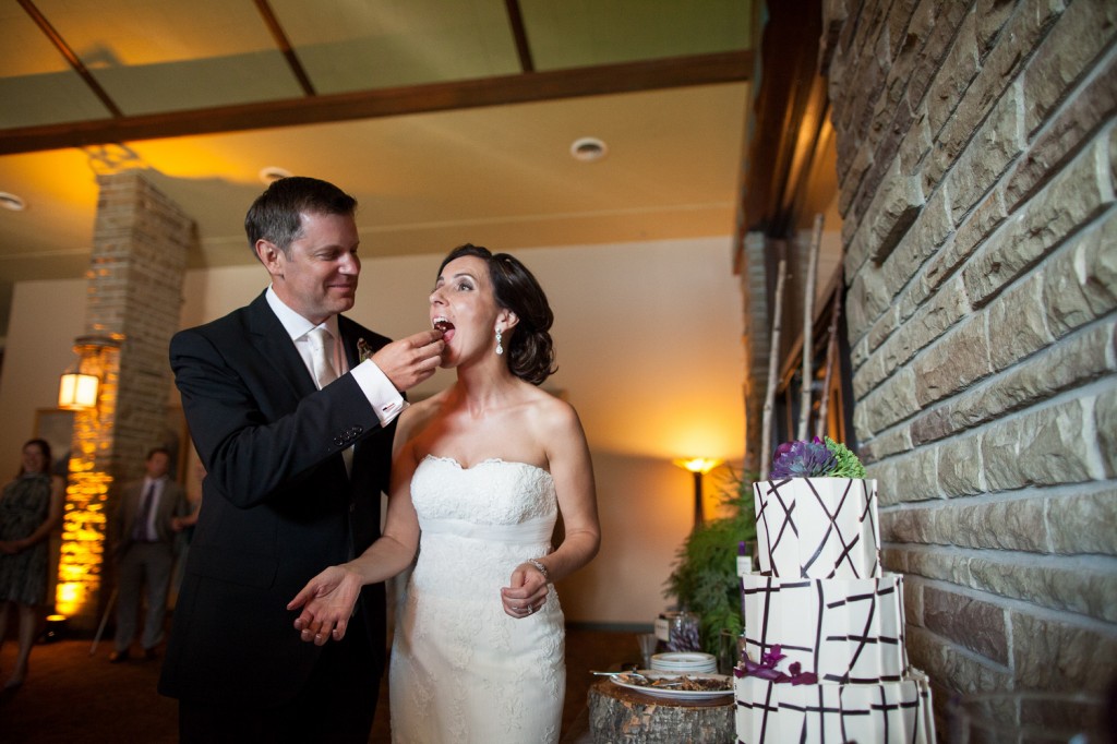 Groom feeds the Bride Some Cake