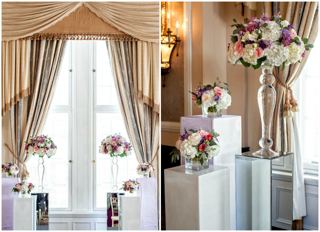 White and Mirrored Pillar with Floral Arrangements