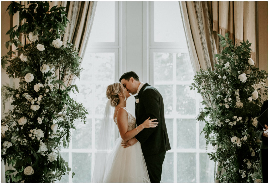 Elegant Ceremony Florals on Drapes